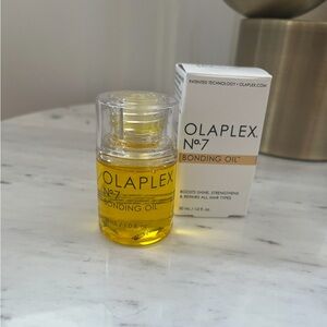 OLAPLEX No.7 Bonding Oil with White and Gold Packaging